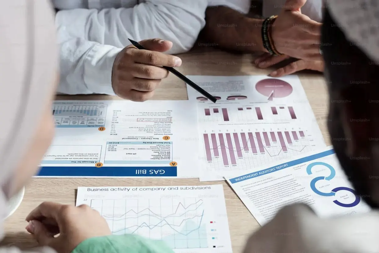 Analytics leads reviewing data strategy on a whiteboard